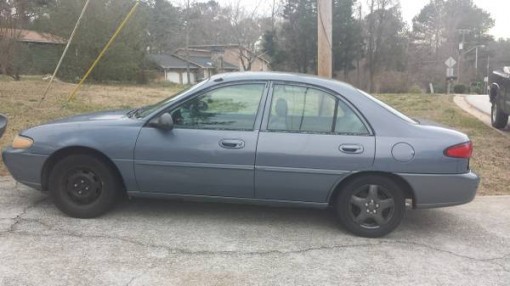 GEICO Insurance Rate Quote For 1999 FORD ESCORT LX 2WD SEDAN 4 DOOR - 2.0L L4  PFI SOHC  8V NP2 $116.2 Per Month 9416715