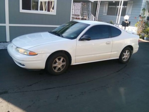 Compare State Farm Co. Insurance Policy Quote For 2003 Oldsmobile Alero ALERO-COUPE $217.52 Per Month 9419678