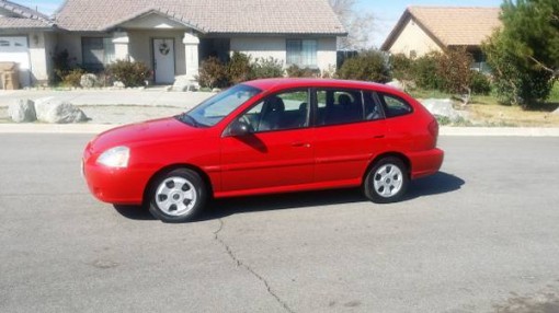 Compare State Farm Insurance Policy Quote For 2004 Kia Rio 4D Wagon $148.6 Per Month 9419236