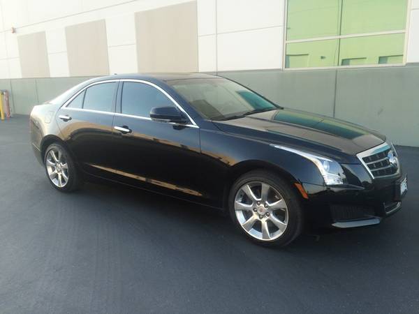 Auto Insurance Rate Quote for 2014 Cadillac ATS 2.5L Luxury in Miami Beach FL $186.34 per Month